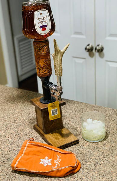 Black Friday special. whiskey tower with tooled bronc