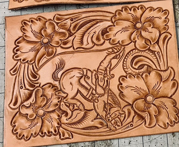 Black Friday special. whiskey tower with tooled bronc